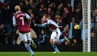 Aston Villa's striker Andreas Weimann (R) celebrates after scoring
